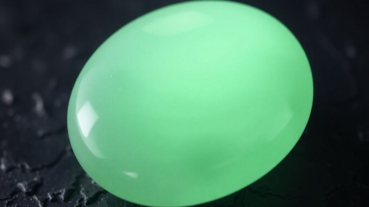 Polished green jade stone with soft luminescence.